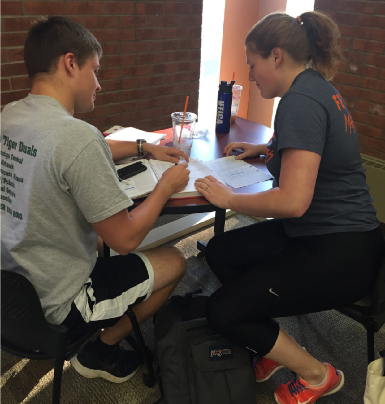 Nick Baker and Angela Conner take advtange of UC’s tutor table. Photo by Issatou Fall Photo by Issatou Fall