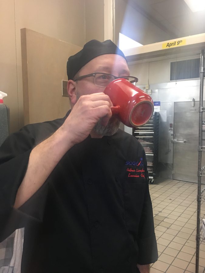Chef Art Langdon drinking his cup of coffee. Photo by Issatou Fall.