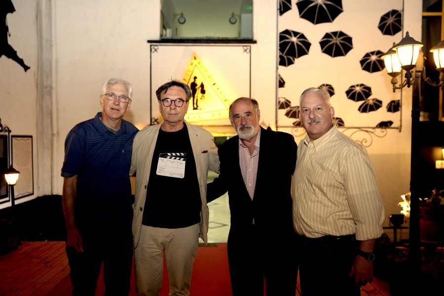 Professor David Chanatry (left), Kujtim Çashku (center-left), Professor Theodore Orlin (center-right) and Professor Thomas Crist (right) at the film festival, which took place in Tirana in. Photo provided by Professor David Chanatry.