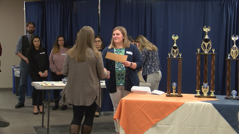 Awards are given out at the 2015 Regional Science Fair at Utica College. Photo source: WKTV