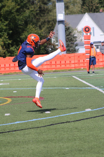 All-American Kicker/Punter Maki Medici punts the ball away during what would have been Utica Colleges 75th Homecoming weekend.