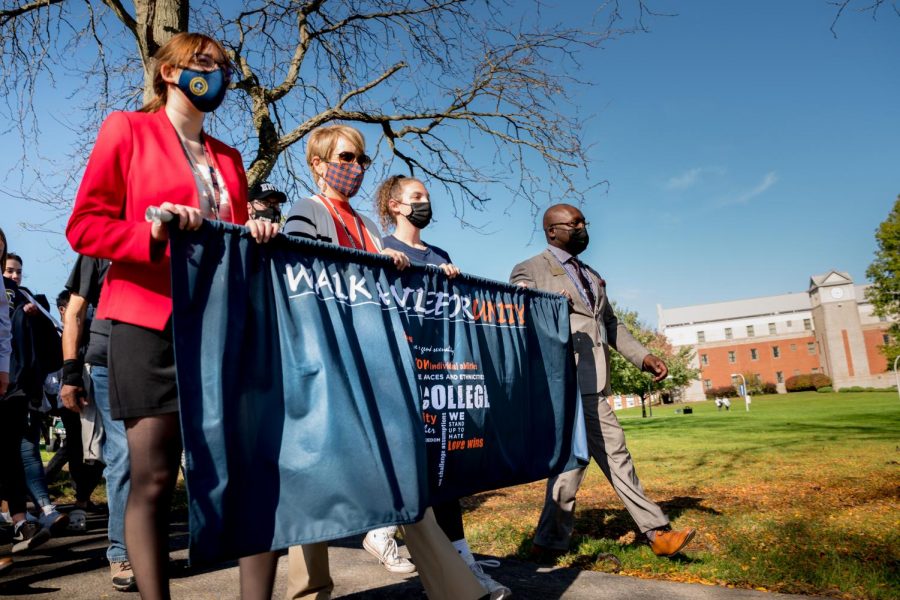 From left, SGA President Katherine Hawley, UC President Laura Casamento, IGC President Dayna Losito and Vice President of DEI Dr. Anthony Baird march at the front of the Unity Walk.