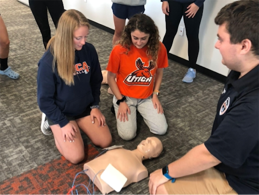 Students participating in the Red Watch Band program at Utica College.