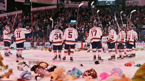 The No.3 ranked Utica College men’s hockey team after the New York SASH Teddy Bear Toss goal.
