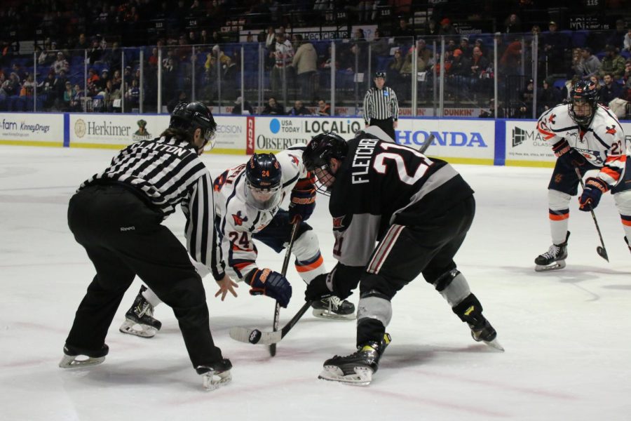 Utica University center Jaime Bucell takes the faceoff in a matchup vs. Manhattanville College.
