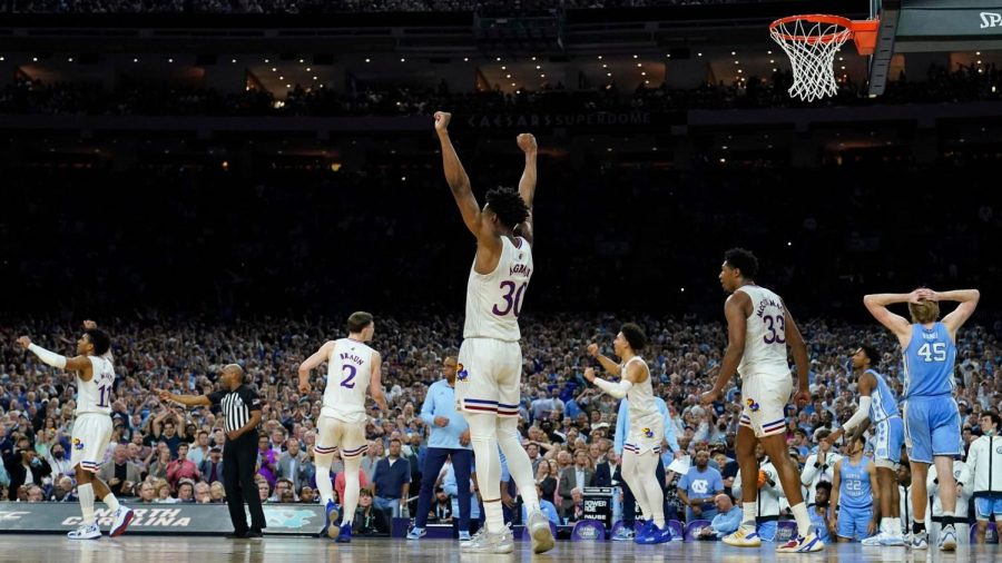Kansas guard Ochai Agbaji (30) celebrates during the second half of a college basketball game against North Carolina in the finals of the Mens Final Four NCAA tournament.