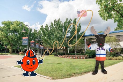 Otto the Orange has captured Trax the Moose as a part of the Syracuse University takeover 
