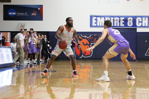 Chris Green crossing over on a defender during the Empire 8 Championship game.