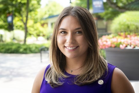 Rayna Orsino, the assistant director of admissions, smiling at the camera.