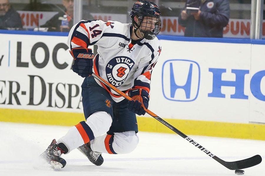 Justin Allen, Utica Mens Ice Hockey, pictured above on the ice for the Pioneers. 
