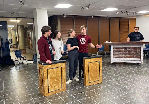 Members of the cast of "Company" rehearse for the show. Photo: Pioneer Players' Facebook page. 