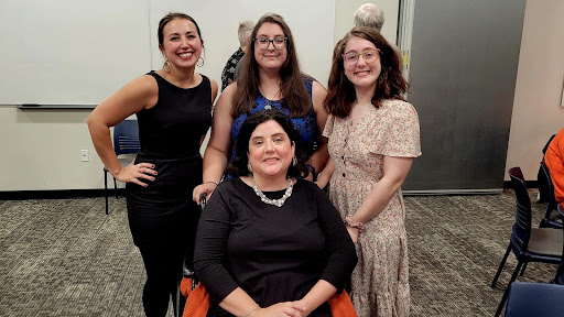 Mary Christopher (seated), surrounded by (from left) Megan Postal, Hollie David and Isabella Hudziak in October 2022. (Photo: Tangerine 75th anniversary Facebook page)