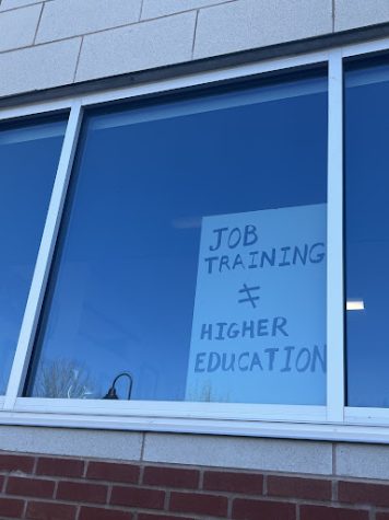 A sign facing out of Dr. Spechts office window.