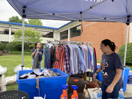 Staff members from the Center for Career Readiness organize clothing donations dropped off on July 12.