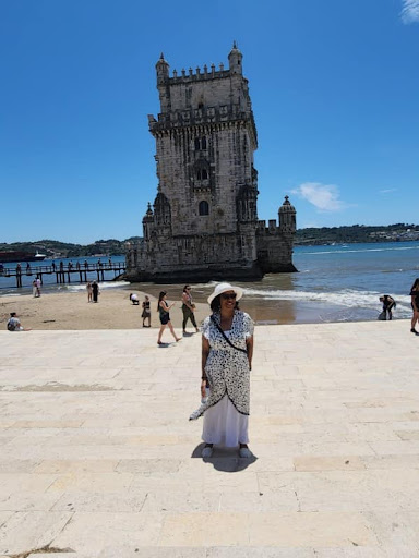 Dr. Marr poses in front of Belém Tower in Lisbon, Portugal. Courtesy of Dr. Marvee Marr
