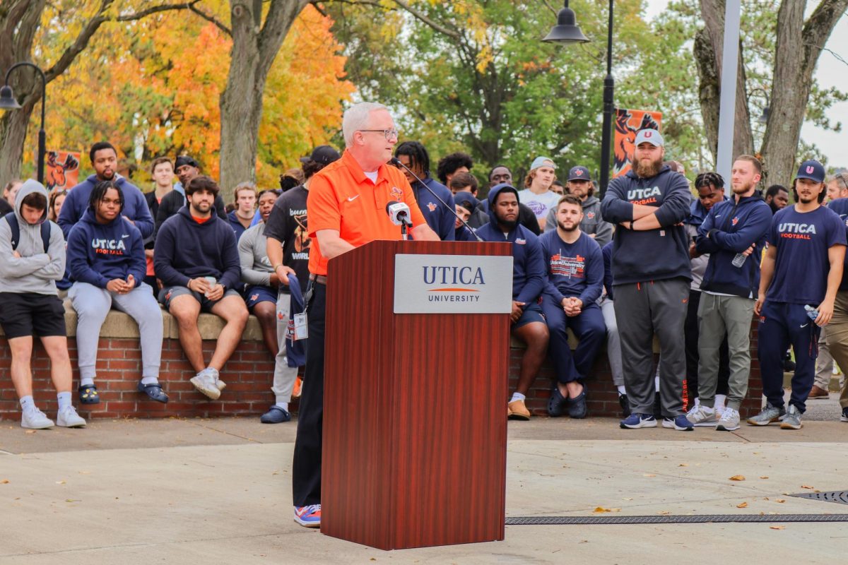 Utica University President Todd Pfannestiel addresses students during the 2023 Unity Walk on campus. Tangerine archive photo. 