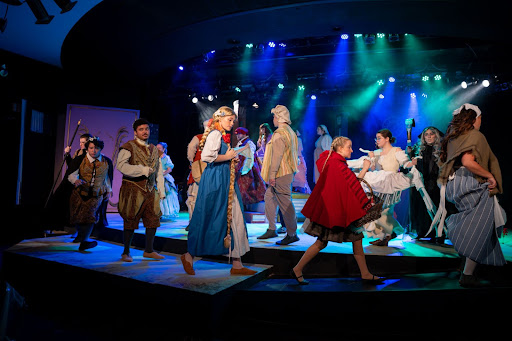 Cast members line up at the opening of the musical. 
