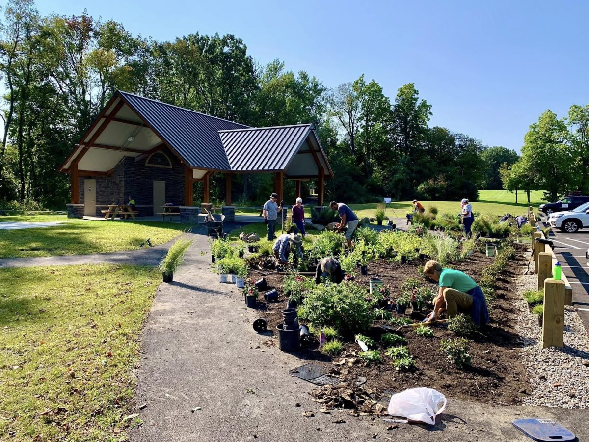 Olmsted City volunteers planting new plants around the new pavilion.
Photo: Olmsted City of Greater Utica