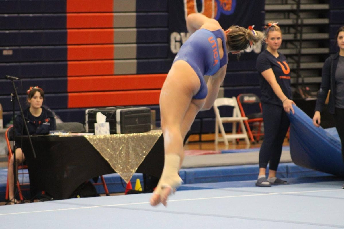 A Utica gymnast during a meet the team event. /Photo courtesy of Luke Reed