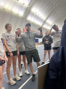 Nate Fredsell, Utica’s strength and conditioning coach, talks to university athletes in the dome. /Photo courtesy of Jamie Eck
