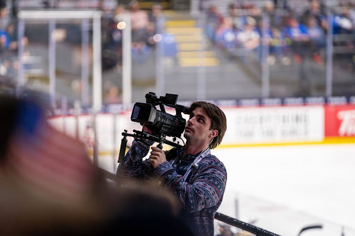 Junior Nico Leonard pans at the camera at fans during the IIHF Women’s World Championship at the Adirondack Bank Center. Photo courtesy of YSM Media. 