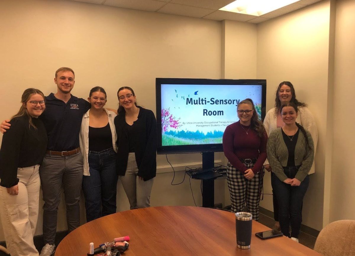 OT students giving their final presentation to the RCIL staff. Photo courtesy of Mary Quinn.