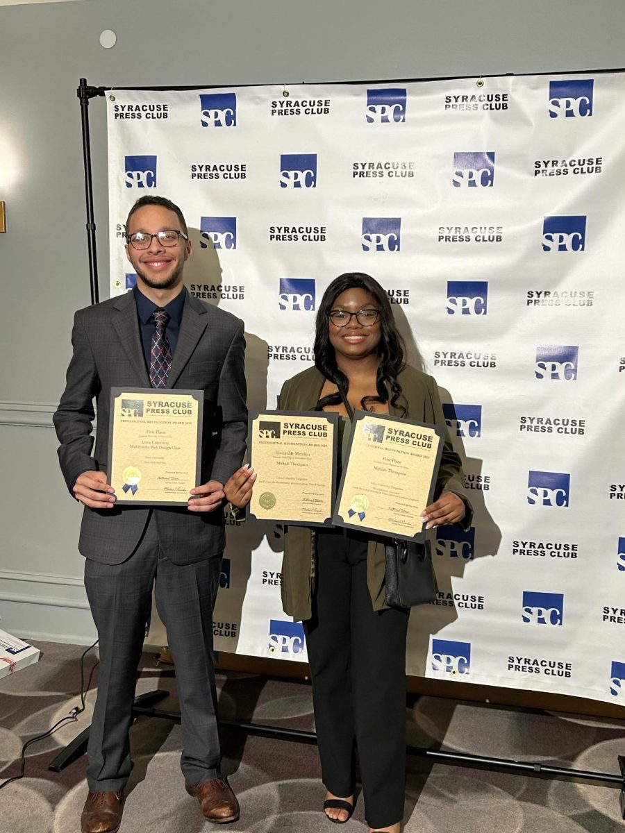 Juniors Nolan Hyman and Briana Ajayi hold Syracuse Press Club Awards at the May 4, 2024 Professional Recognition Awards Dinner. Hyman and Ajayi contributed to the Utica Parks and You multimedia project, which won first place in the Student Best Use of Multimedia category. Photo: Mary Christopher