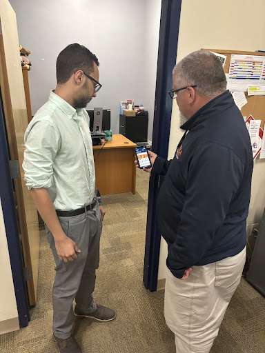 Associate Director of Campus Safety, Jay LaFayette, explaining the features of the Safer U app. Photo courtesy of Nolan Hyman.