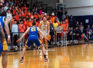 Call with the ball against SUNY Poly. Photo by Shotsbysturdy