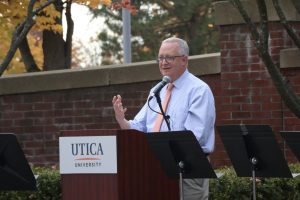 Photo from Tangerine Archive. Utica University President Todd Pfannestiel speaks at the 2024 Unity Walk. 