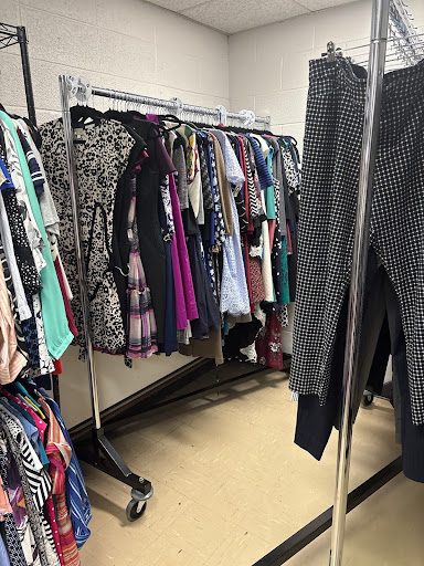 Racks of clothing in the new Career Closet, located in rooms B6 and B7 in the basement of Hubbard Hall, are stocked with professional attire for students.  Photo by Grace Christopher.