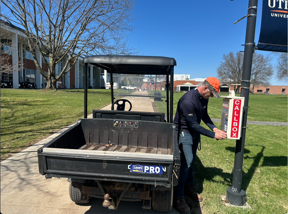 A contractor completes maintenance work on a campus call box. Utica University is gearing up to host the New York State Summer Special Olympics. 